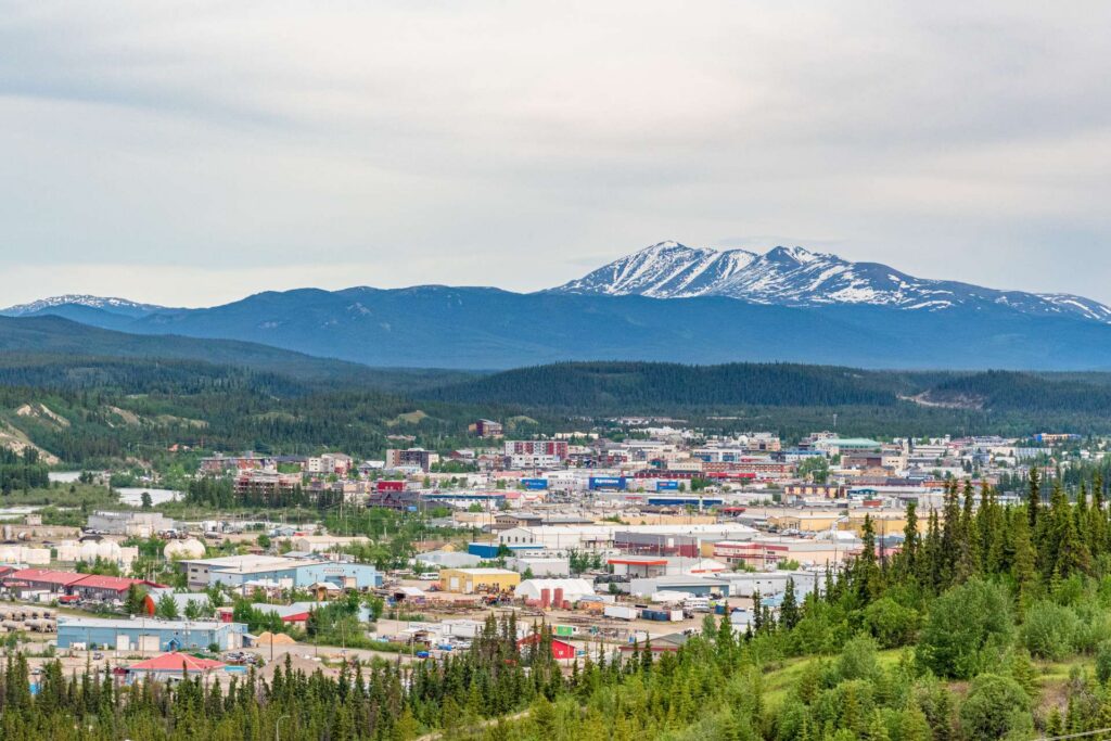 aerial shot of whitehorse in summer featuring industrial infrastructure in the foreground